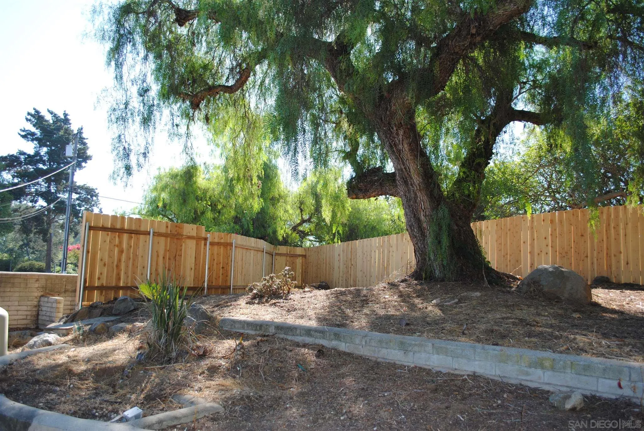 4826 New Ranch Road El Cajon, CA 92020 - Photo 17 of 19 a view of a backyard