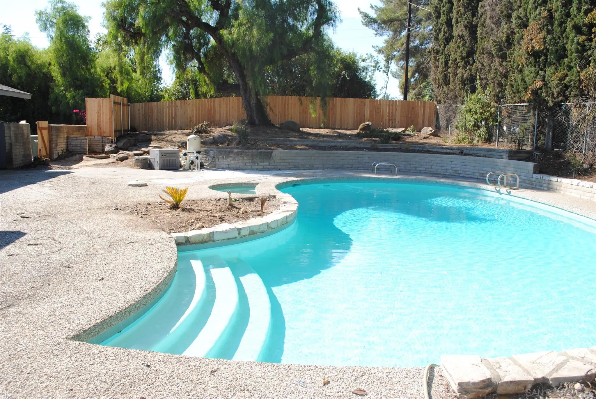 4826 New Ranch Road El Cajon, CA 92020 - Photo 18 of 19 a view of a backyard with swimming pool
