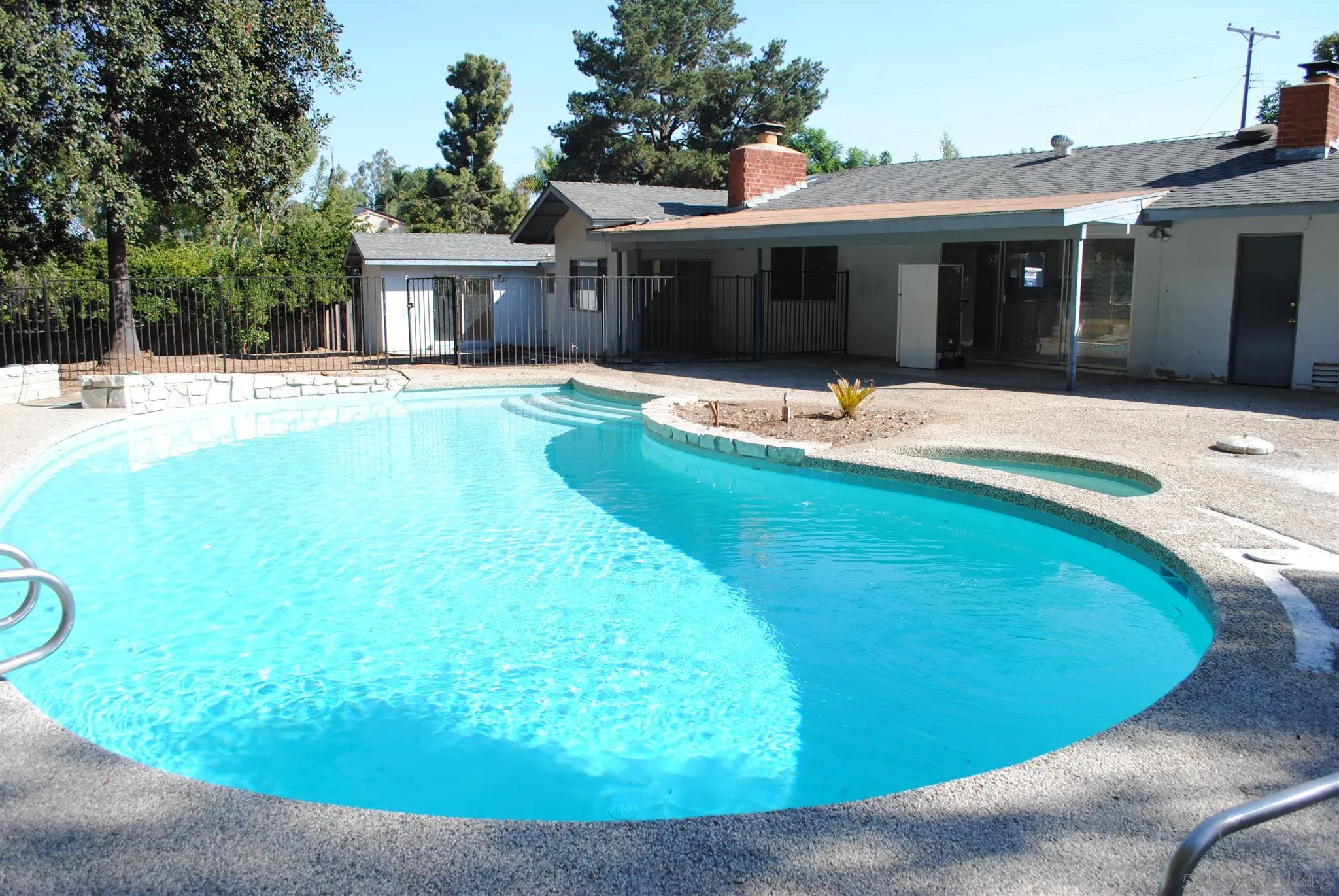 4826 New Ranch Road El Cajon, CA 92020 - Photo 19 of 19 a view of a house with swimming pool