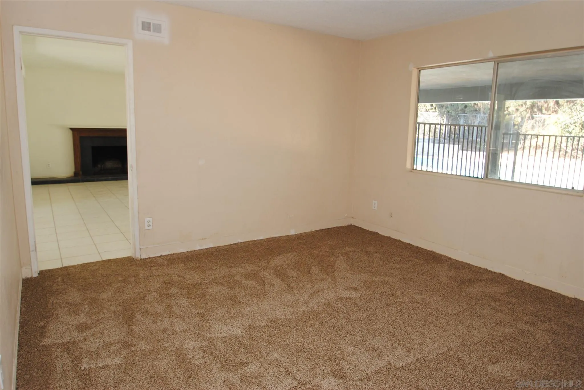 4826 New Ranch Road El Cajon, CA 92020 - Photo 7 of 19 a view of empty room with windows