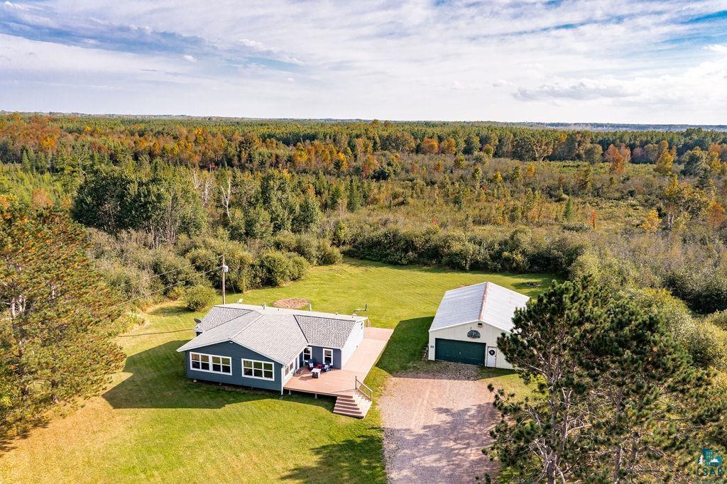 6638 Tabako Road Wright, MN 55798 - Photo 1 of 34 Aerial view of property and surrounding area with a forest