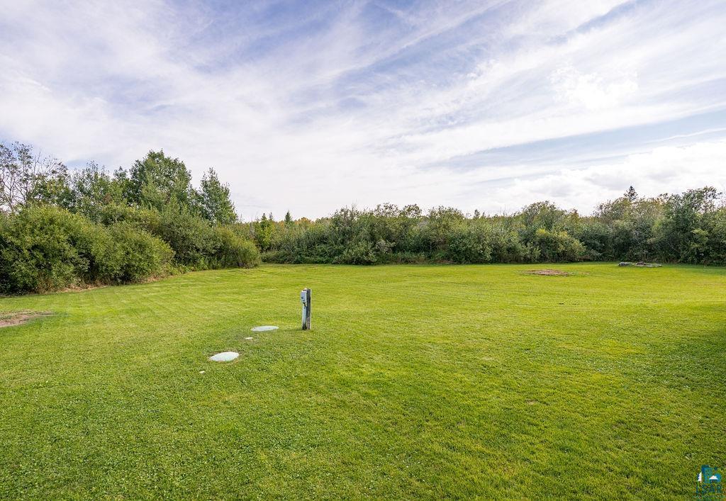 6638 Tabako Road Wright, MN 55798 - Photo 22 of 34 View of green lawn