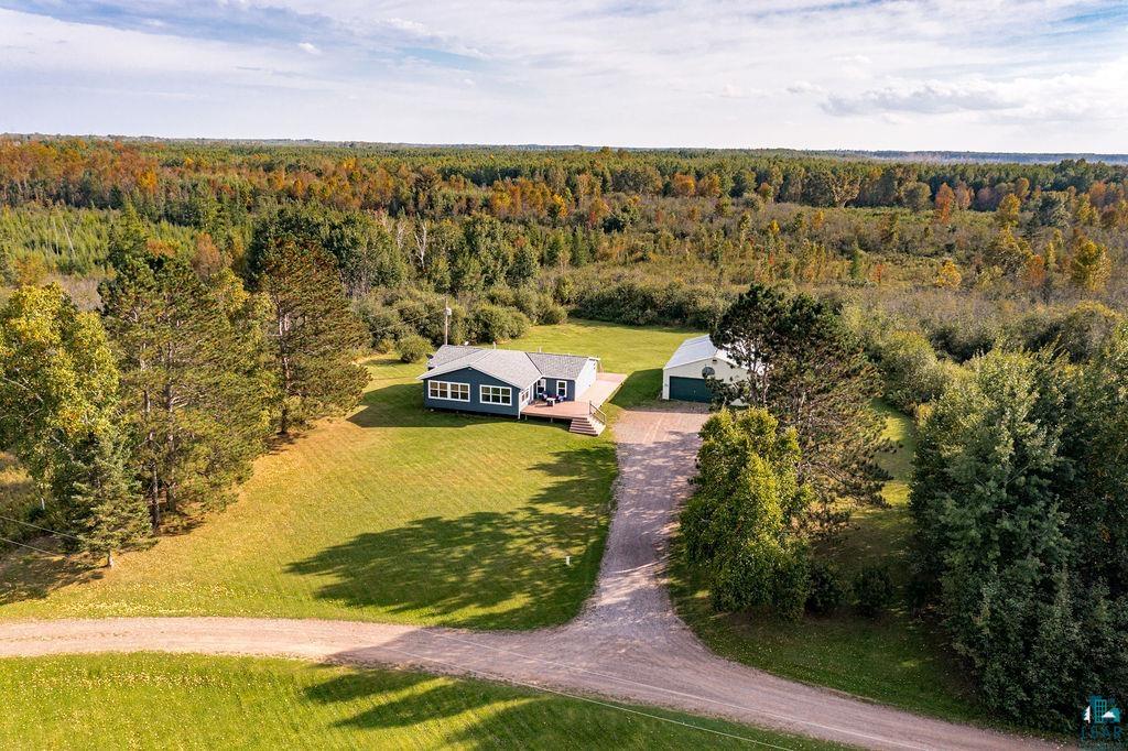 6638 Tabako Road Wright, MN 55798 - Photo 25 of 34 View from above of property featuring a heavily wooded area
