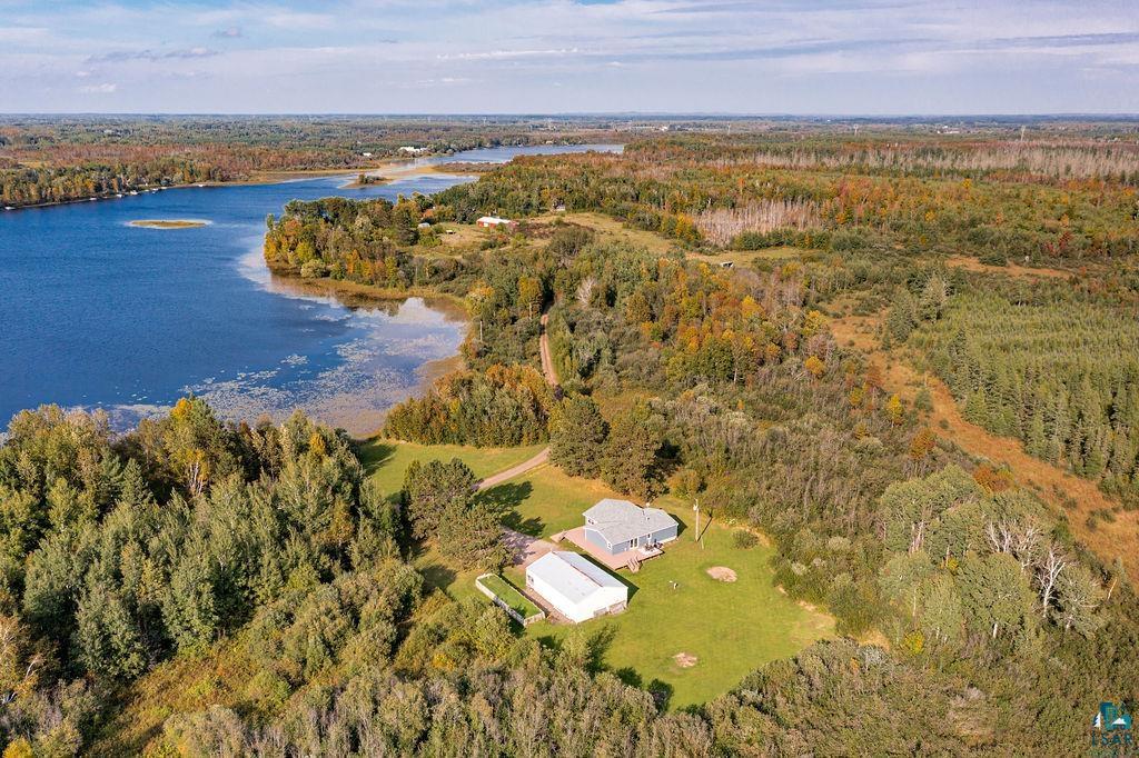 6638 Tabako Road Wright, MN 55798 - Photo 33 of 34 Bird's eye view of a forest and a nearby body of water