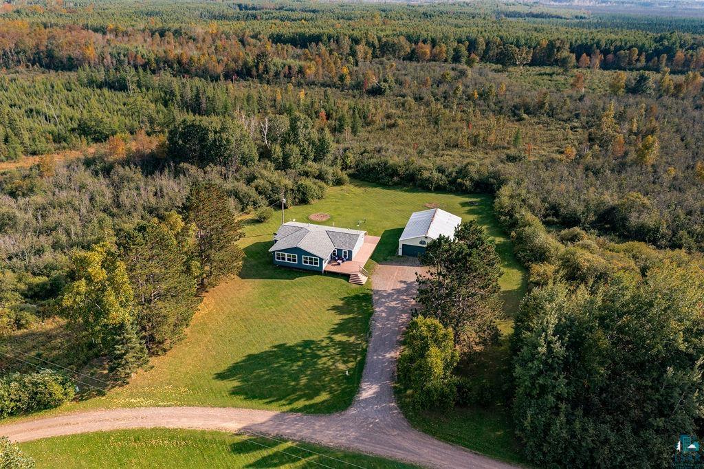 6638 Tabako Road Wright, MN 55798 - Photo 34 of 34 View of subject property with a heavily wooded area