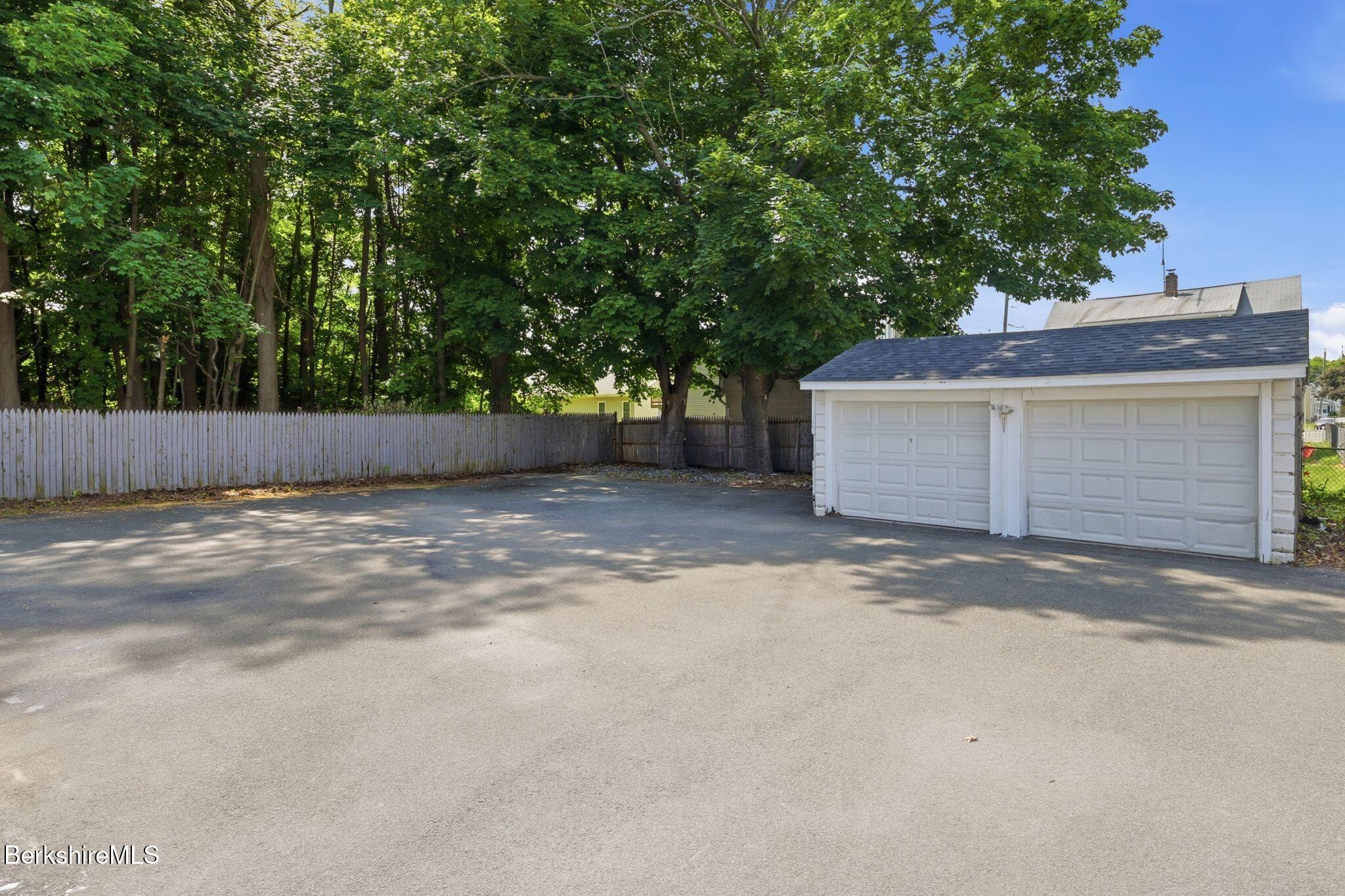910-912 Granby Road Chicopee, MA 01020 - Photo 3 of 56 Two-car garage with power doors