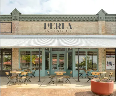 a view of a cafe with an outdoor seating