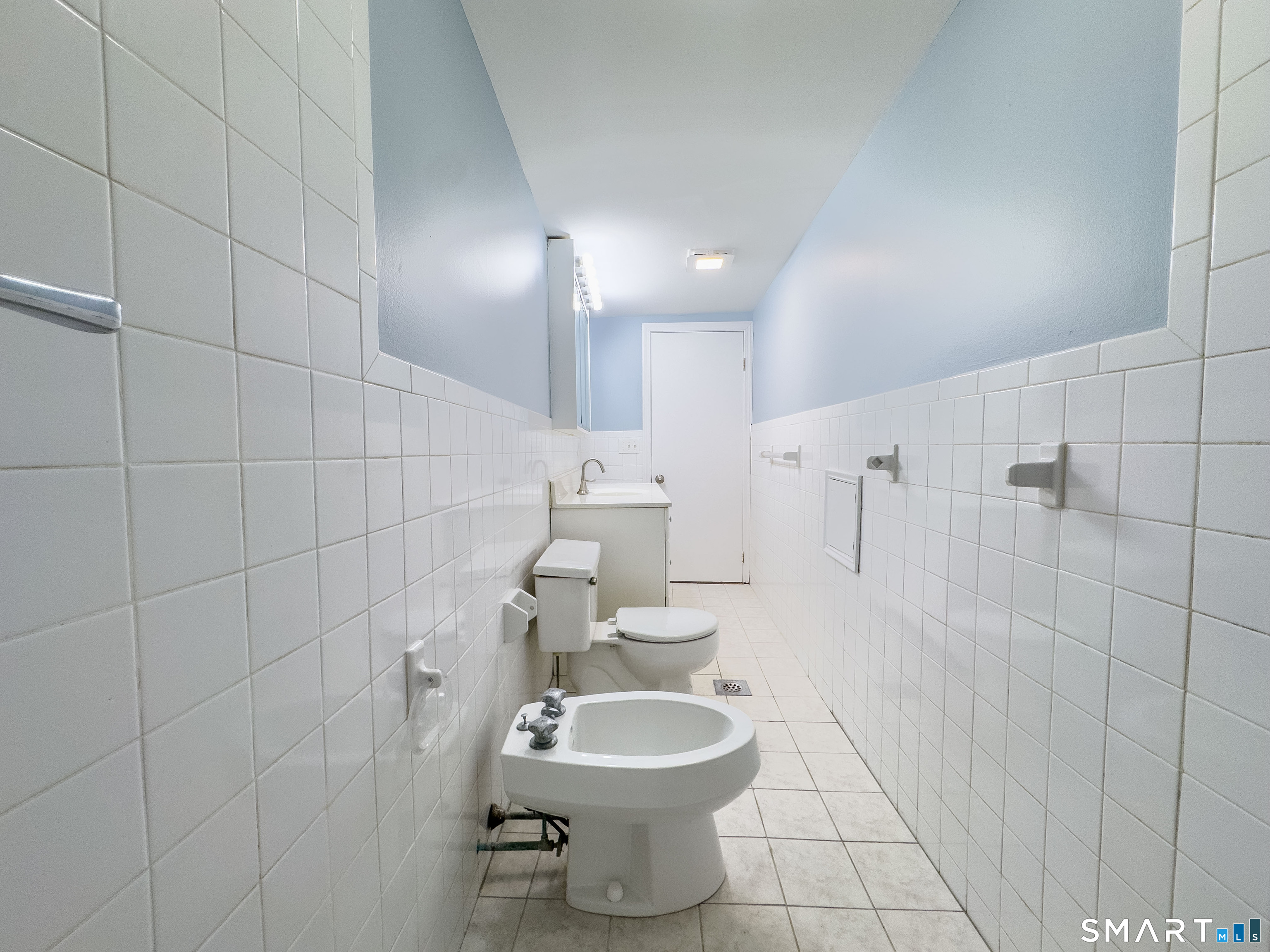 167 North Hoadley Street Naugatuck, CT 06770 - Photo 13 of 17 a bathroom with a toilet sink and shower