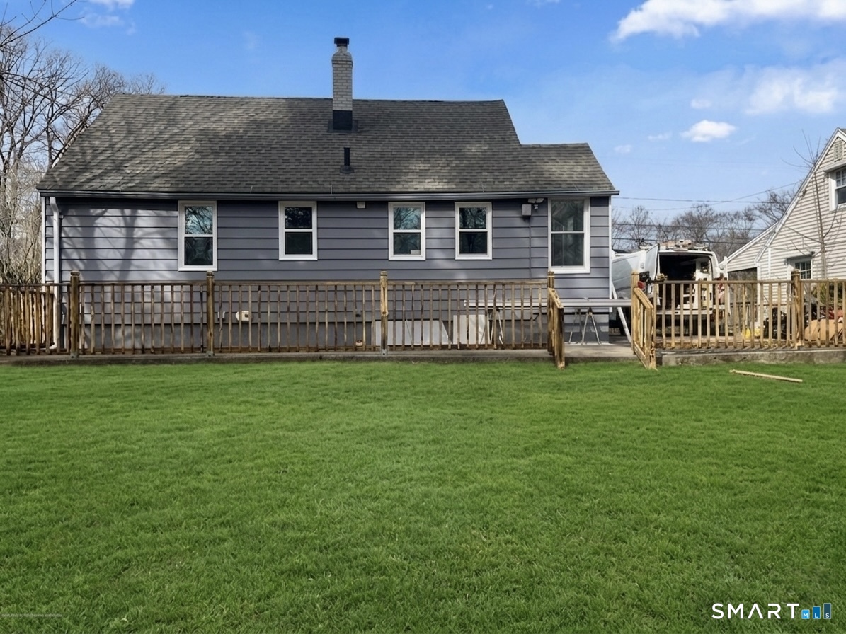167 North Hoadley Street Naugatuck, CT 06770 - Photo 2 of 17 a front view of a house with a garden
