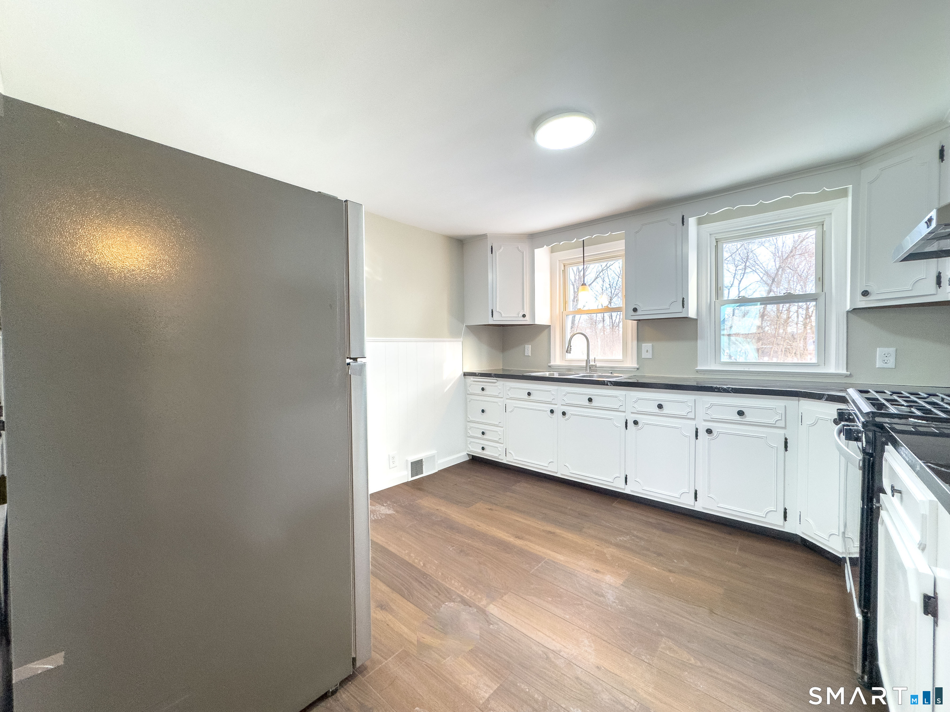 167 North Hoadley Street Naugatuck, CT 06770 - Photo 5 of 17 a view of a kitchen with a sink