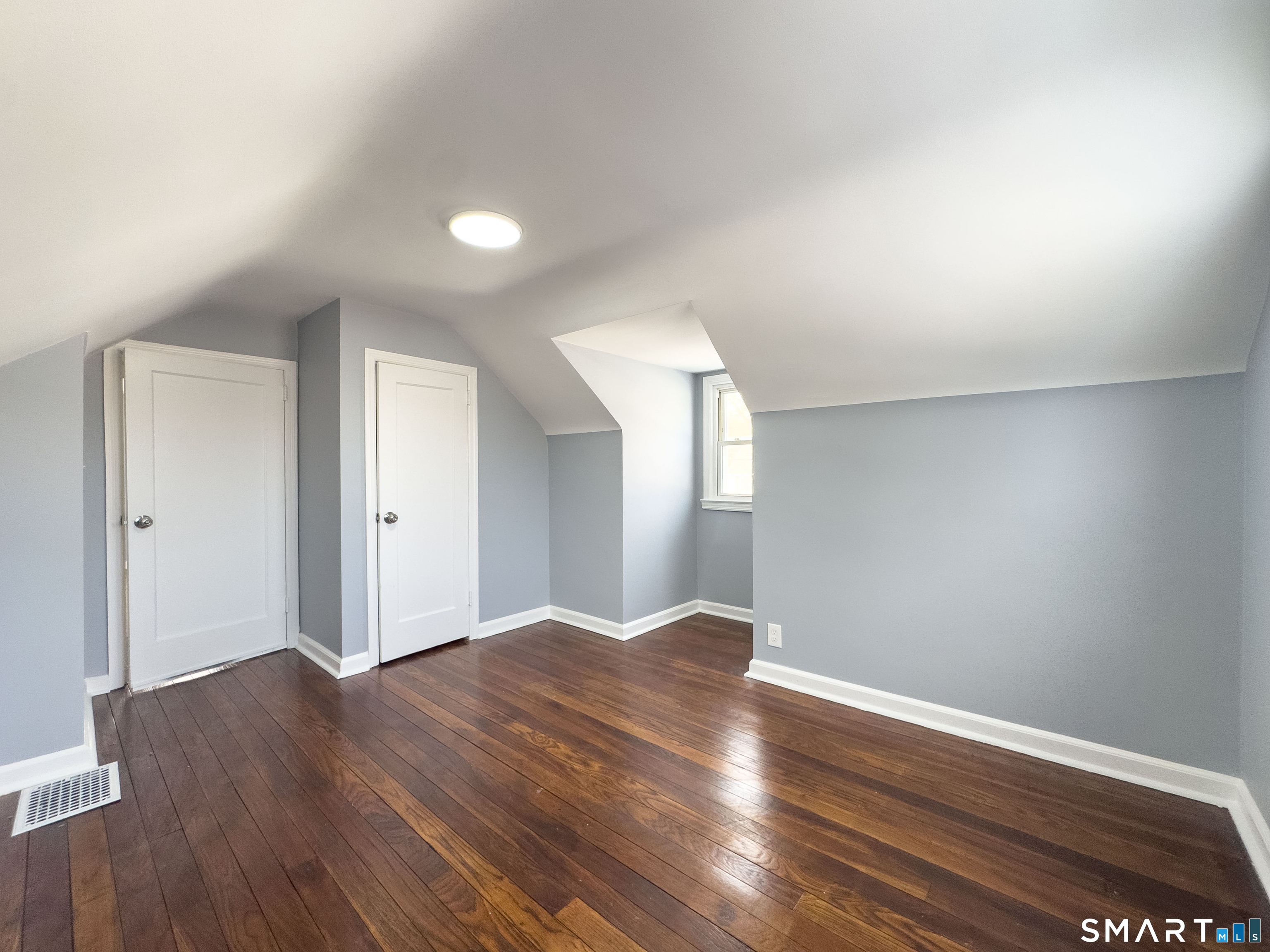 167 North Hoadley Street Naugatuck, CT 06770 - Photo 10 of 17 a view of empty room with wooden floor