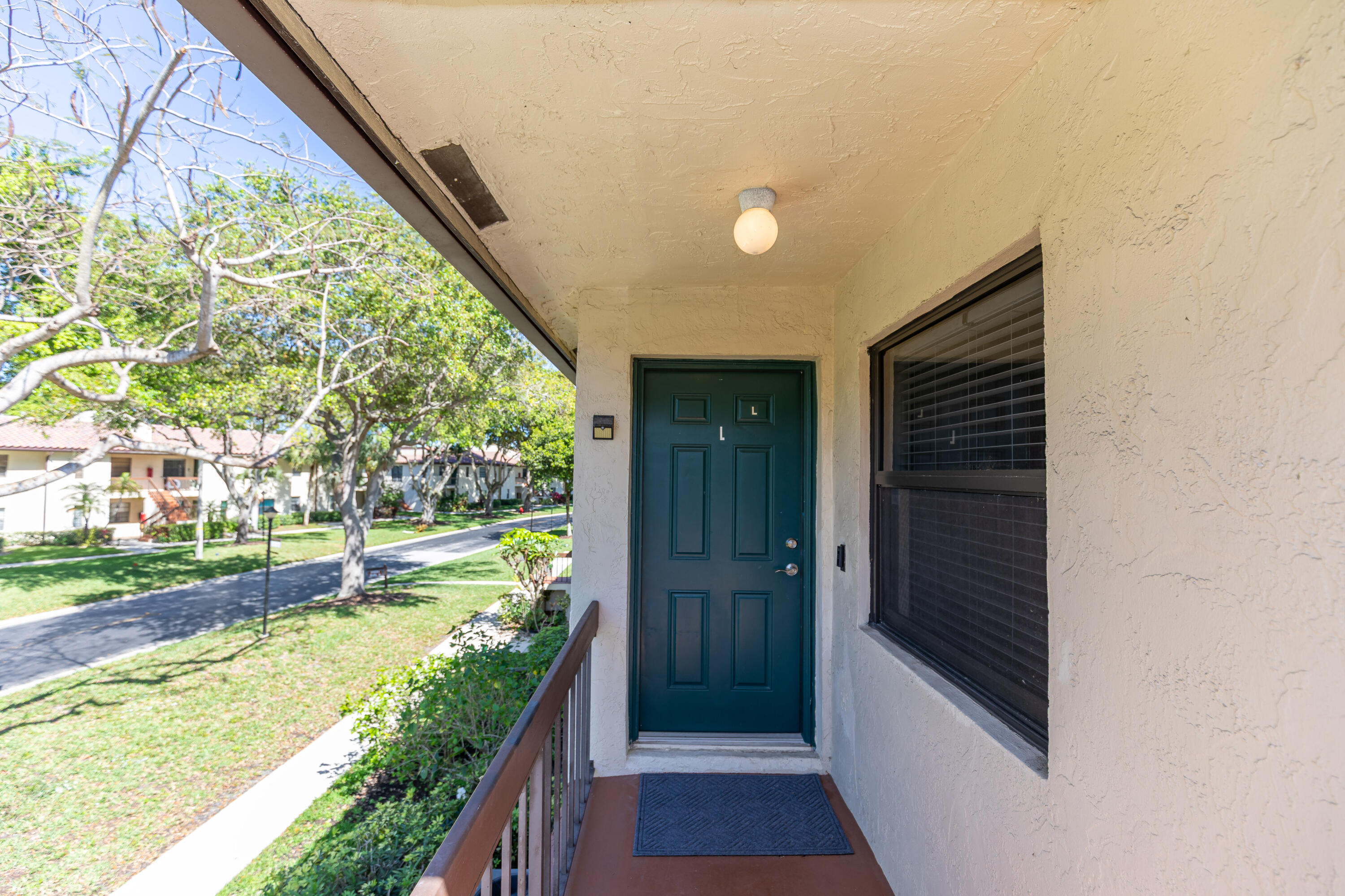 21851 Arriba Real, Unit L Boca Raton, FL 33433 - Photo 54 of 63 Front Door