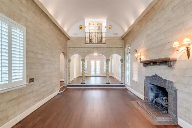 a view of fireplace with wooden floor