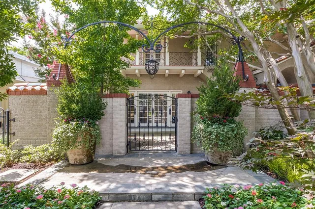 front view of a house with a garden