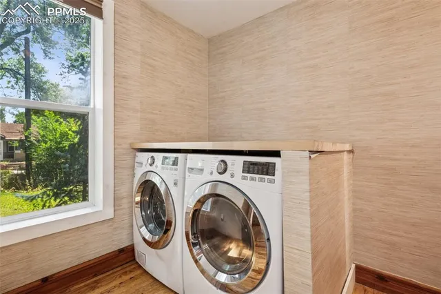 a utility room with dryer and washer