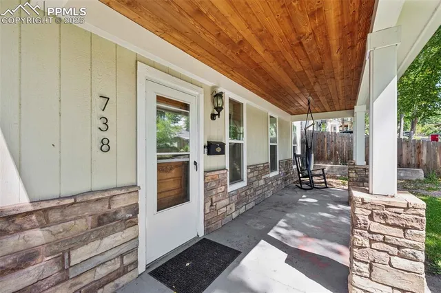 a view of living room filled with furniture