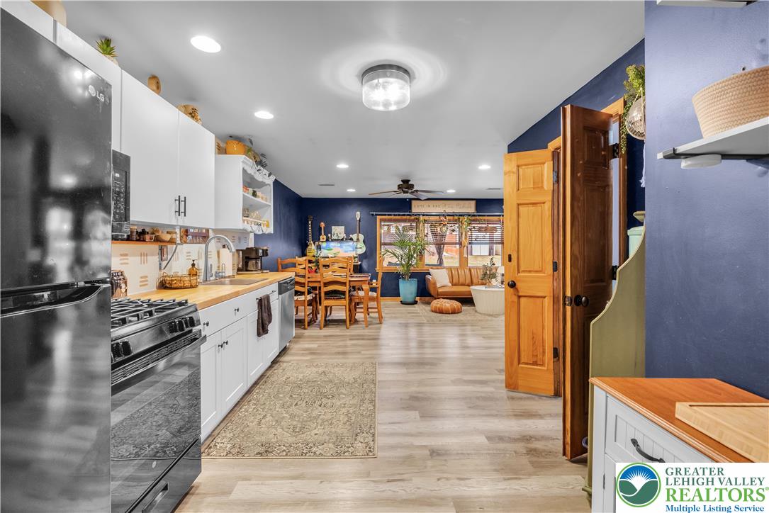 2031 Wayne Street Bethlehem, PA 18020 - Photo 12 of 36 a large kitchen with lots of appliances and a dining table