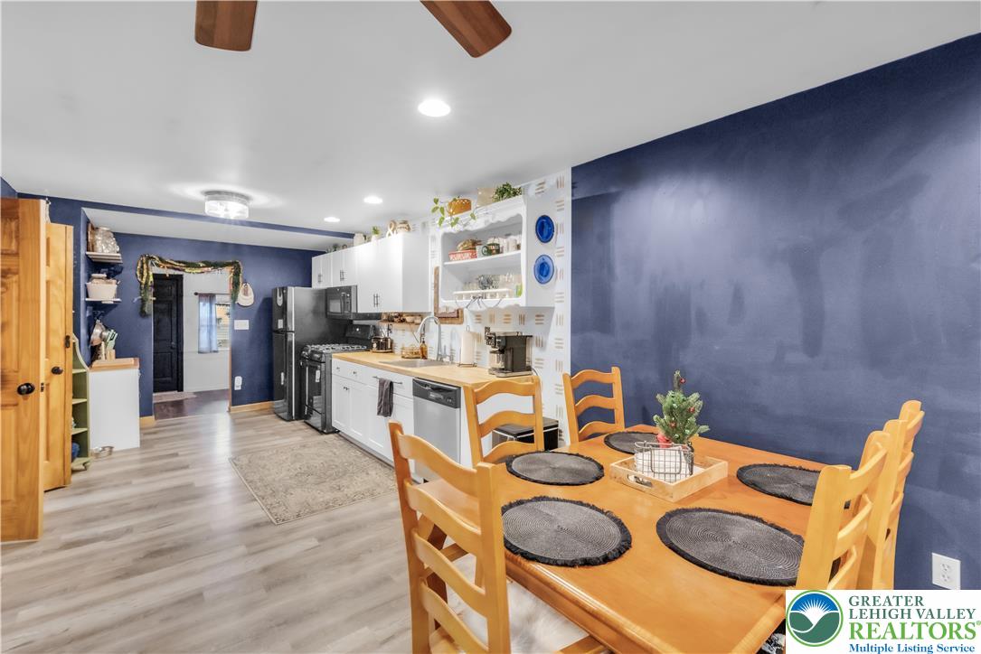 2031 Wayne Street Bethlehem, PA 18020 - Photo 15 of 36 a open dining room with furniture and wooden floor