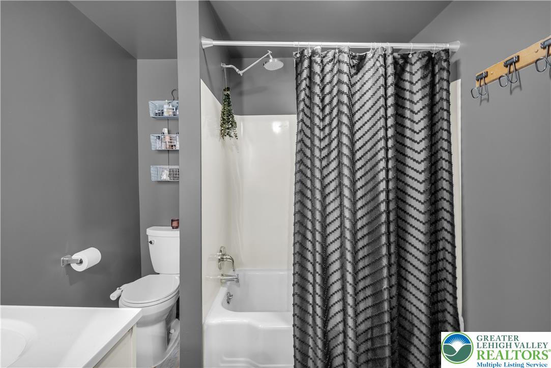 2031 Wayne Street Bethlehem, PA 18020 - Photo 16 of 36 a white toilet sitting next to a bathroom sink