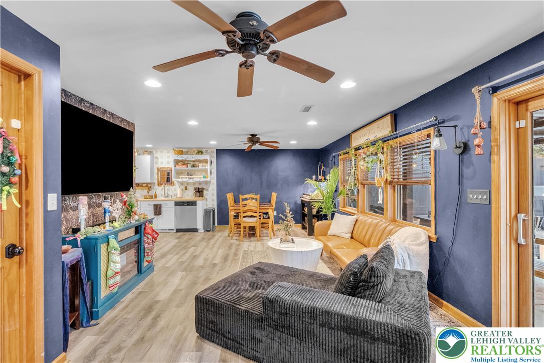 2031 Wayne Street Bethlehem, PA 18020 - Photo 19 of 36 a living room with furniture and a flat screen tv