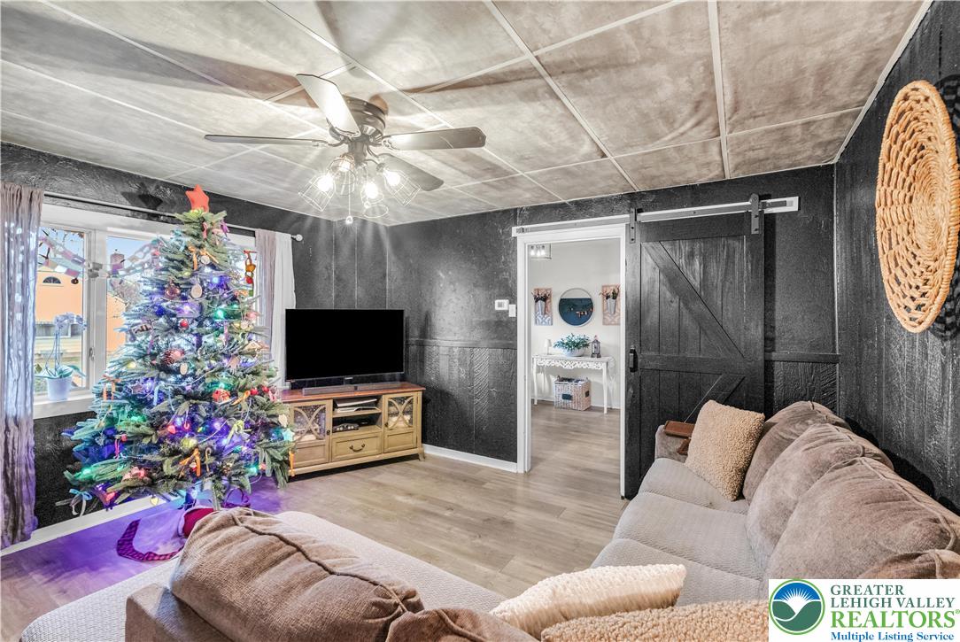 2031 Wayne Street Bethlehem, PA 18020 - Photo 25 of 36 a living room with furniture and a flat screen tv
