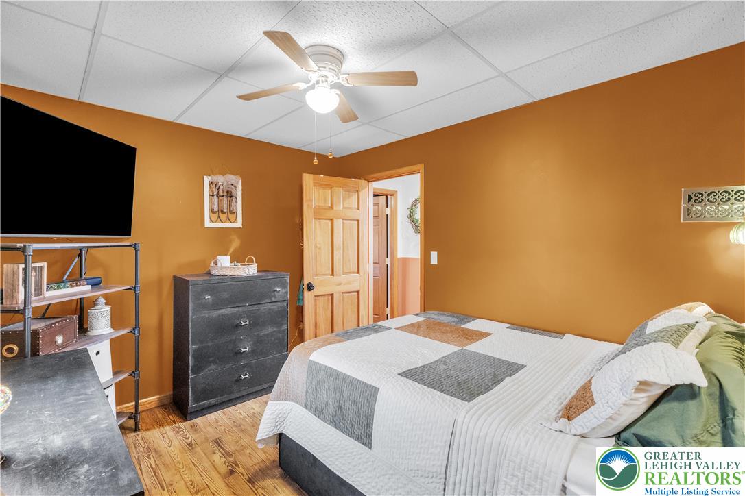 2031 Wayne Street Bethlehem, PA 18020 - Photo 29 of 36 a bedroom with a bed and a flat screen tv