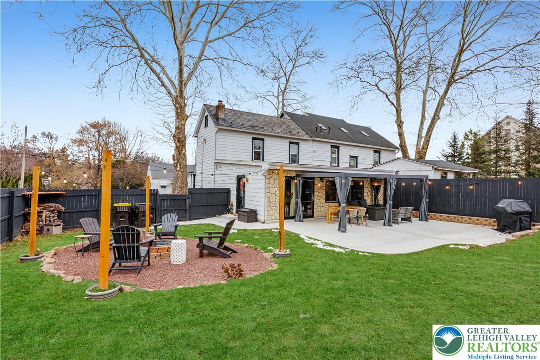 2031 Wayne Street Bethlehem, PA 18020 - Photo 35 of 36 a view of a house with patio and a yard