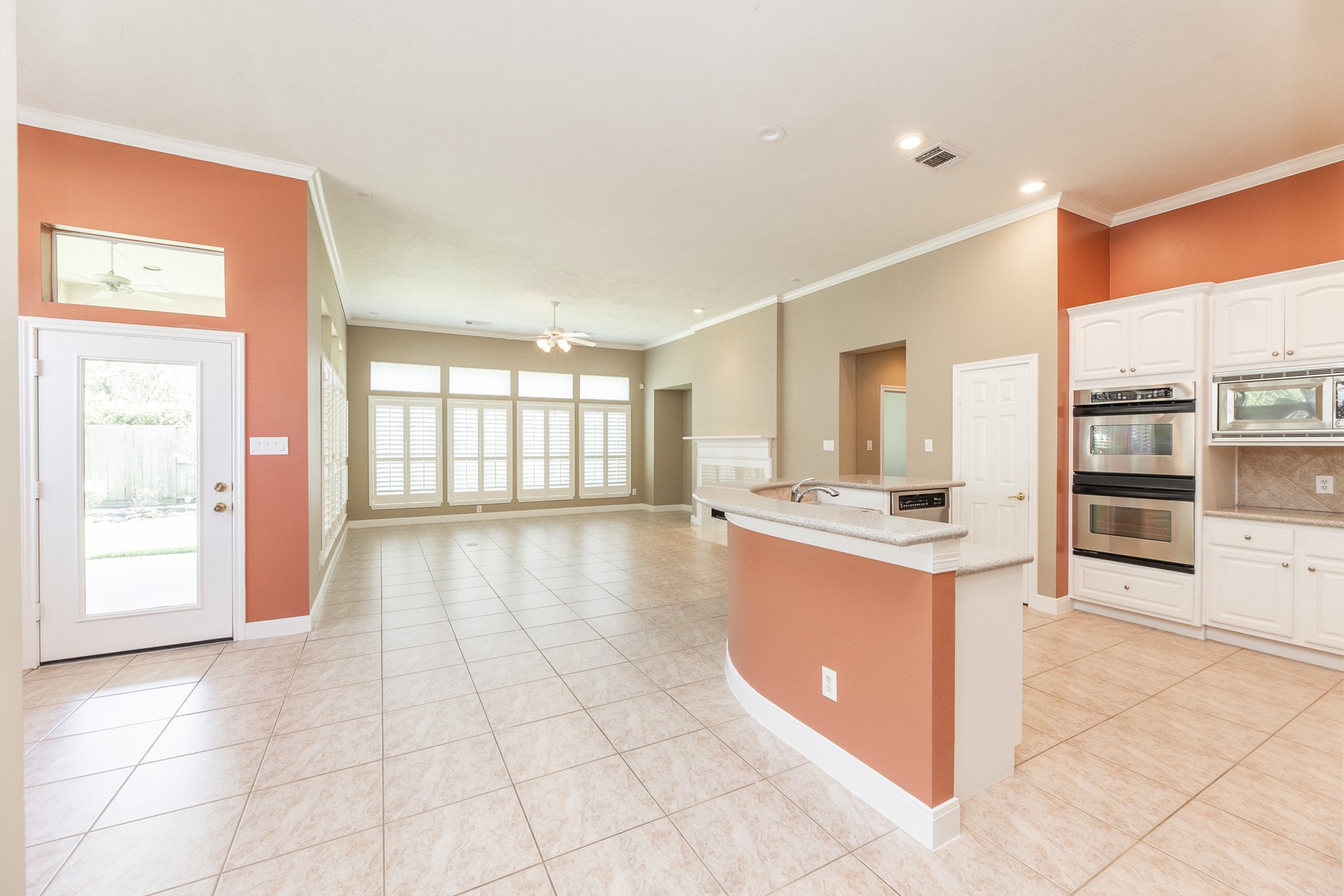 1222 Brinson Court Spring, TX 77379 - Photo 11 of 35 a large kitchen with stainless steel appliances a stove a sink and a refrigerator