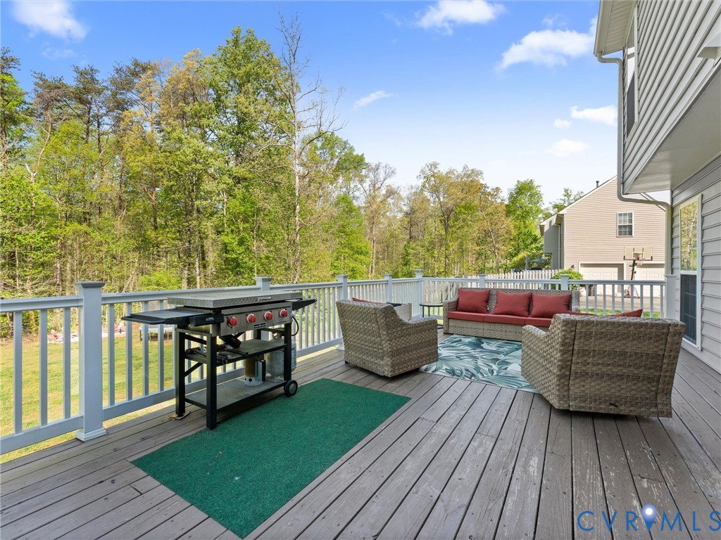 126 Reedy Creek Road Louisa, VA 23093 - Photo 55 of 68 Expansive outdoor deck with a wooden surface and w