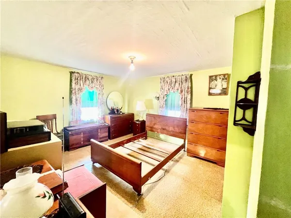 a living room with furniture and a open area