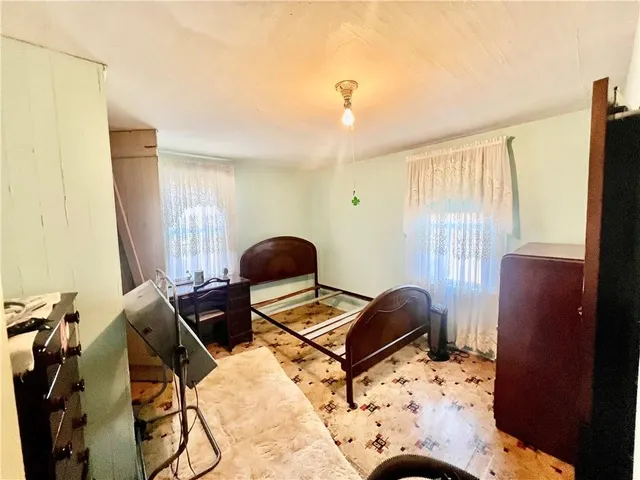 a room with furniture and a window