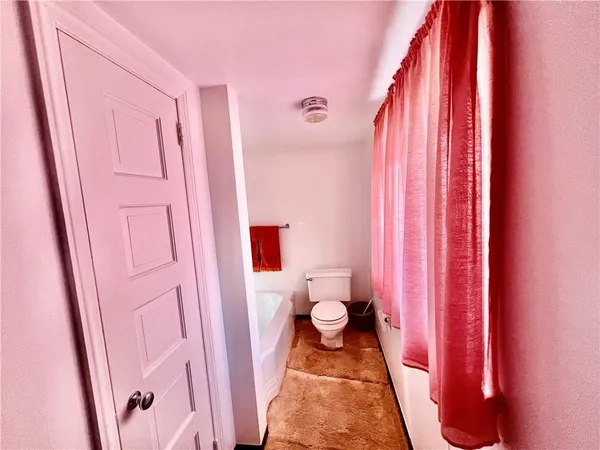 a bathroom with a sink and a shower curtain