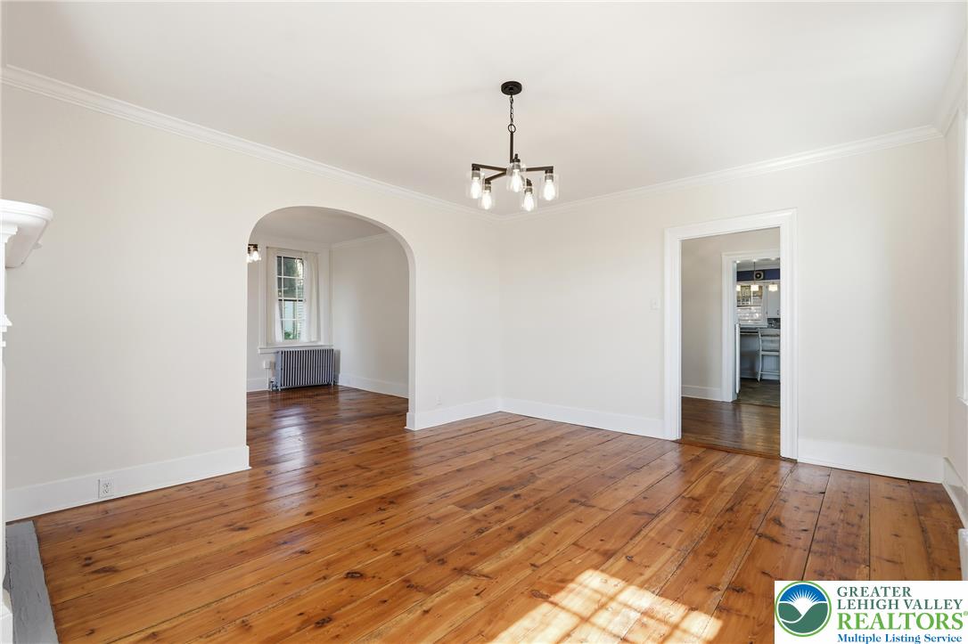 4682 Steuben Road Bethlehem, PA 18020 - Photo 12 of 79 Hardwood floors and graceful archways define this adaptable living space.