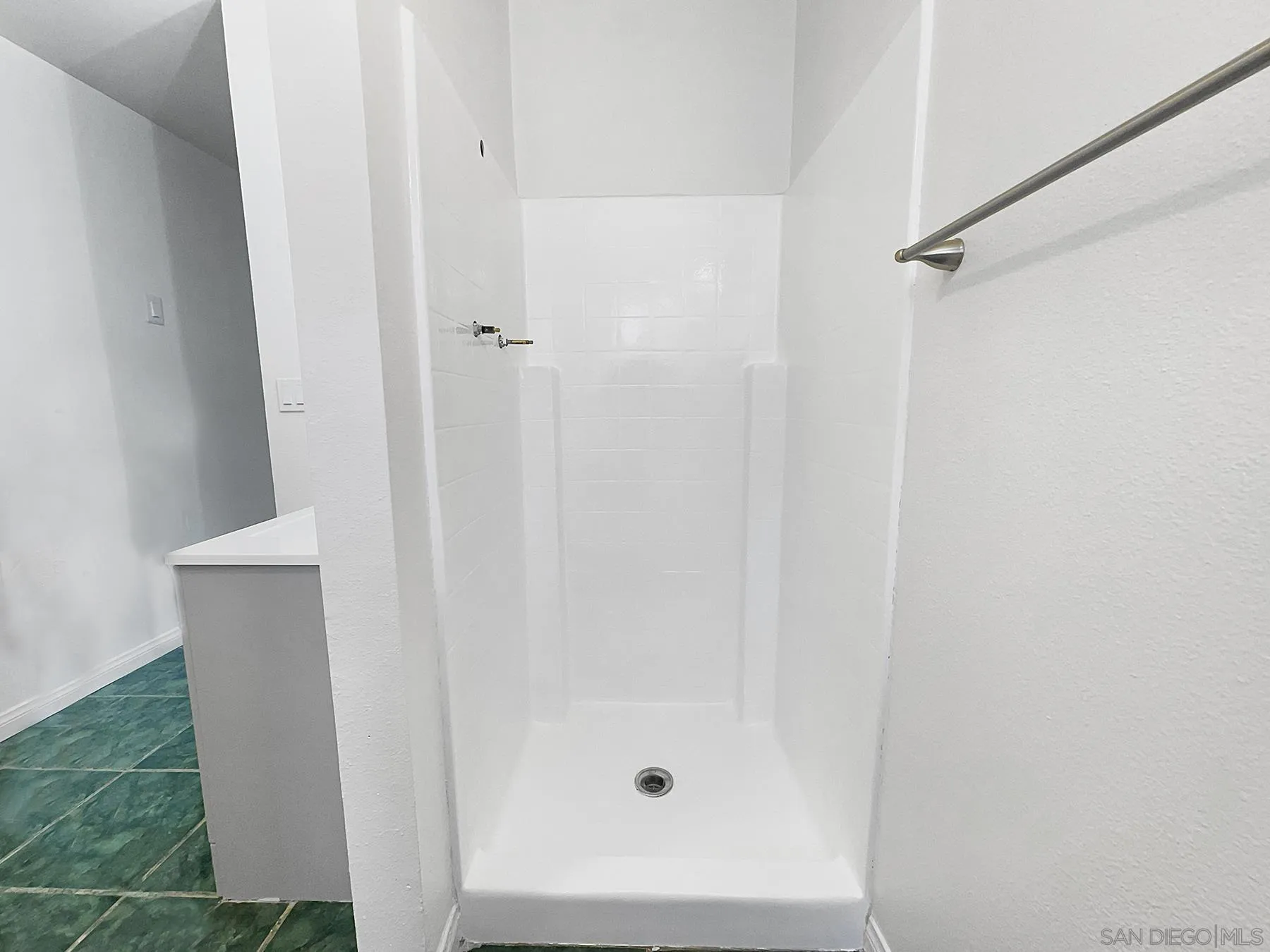 9820 St George Street Spring Valley, CA 91977 - Photo 12 of 23 a bathroom with a shower