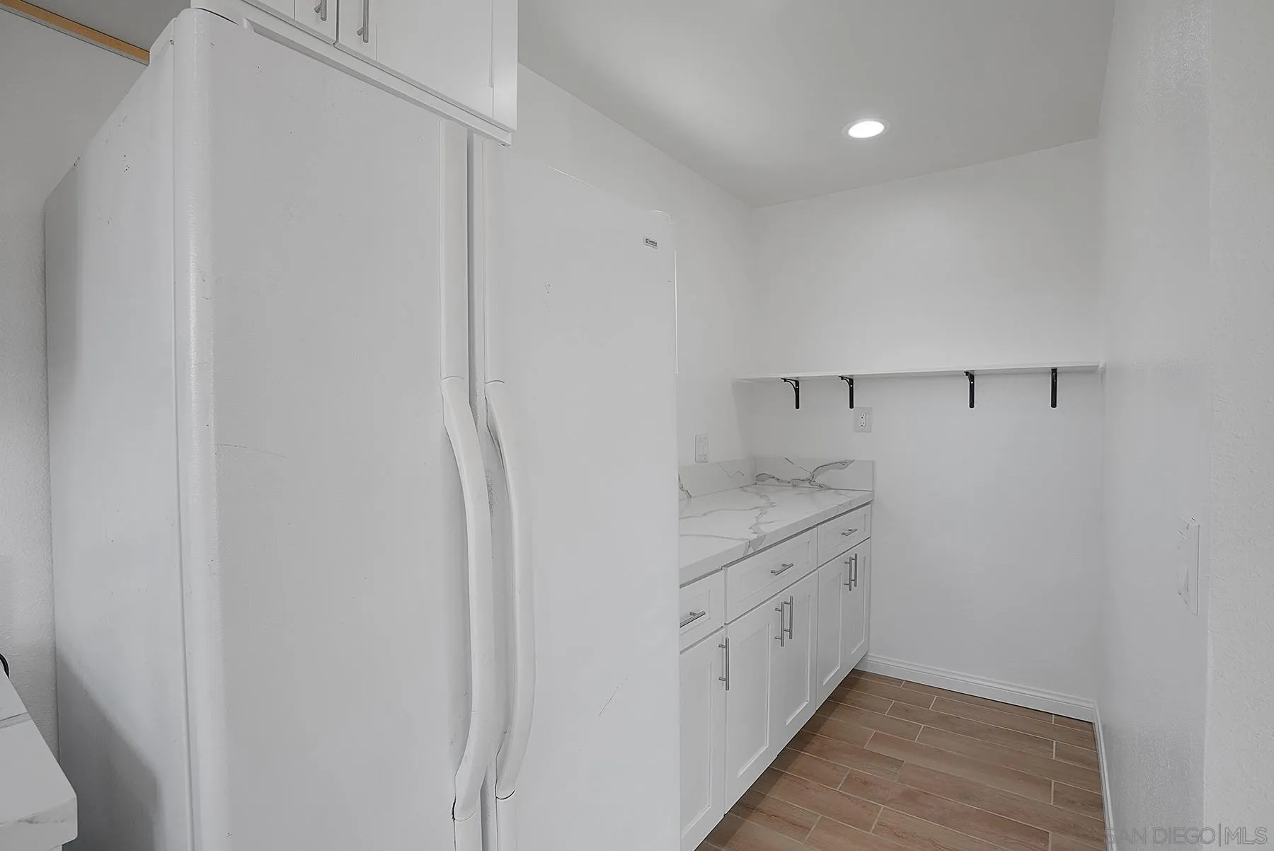 9820 St George Street Spring Valley, CA 91977 - Photo 6 of 23 a view of cabinets