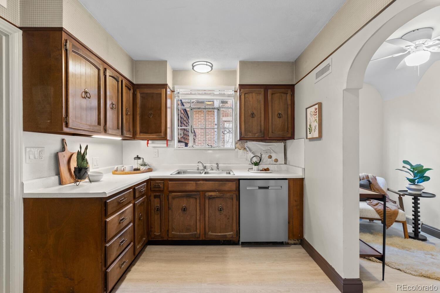 390 Dexter Street Denver, CO 80220 - Photo 13 of 30 a spacious bathroom with a double vanity sink and a mirror