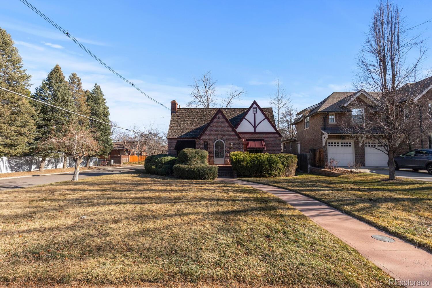 390 Dexter Street Denver, CO 80220 - Photo 28 of 30 a view of a house with a yard