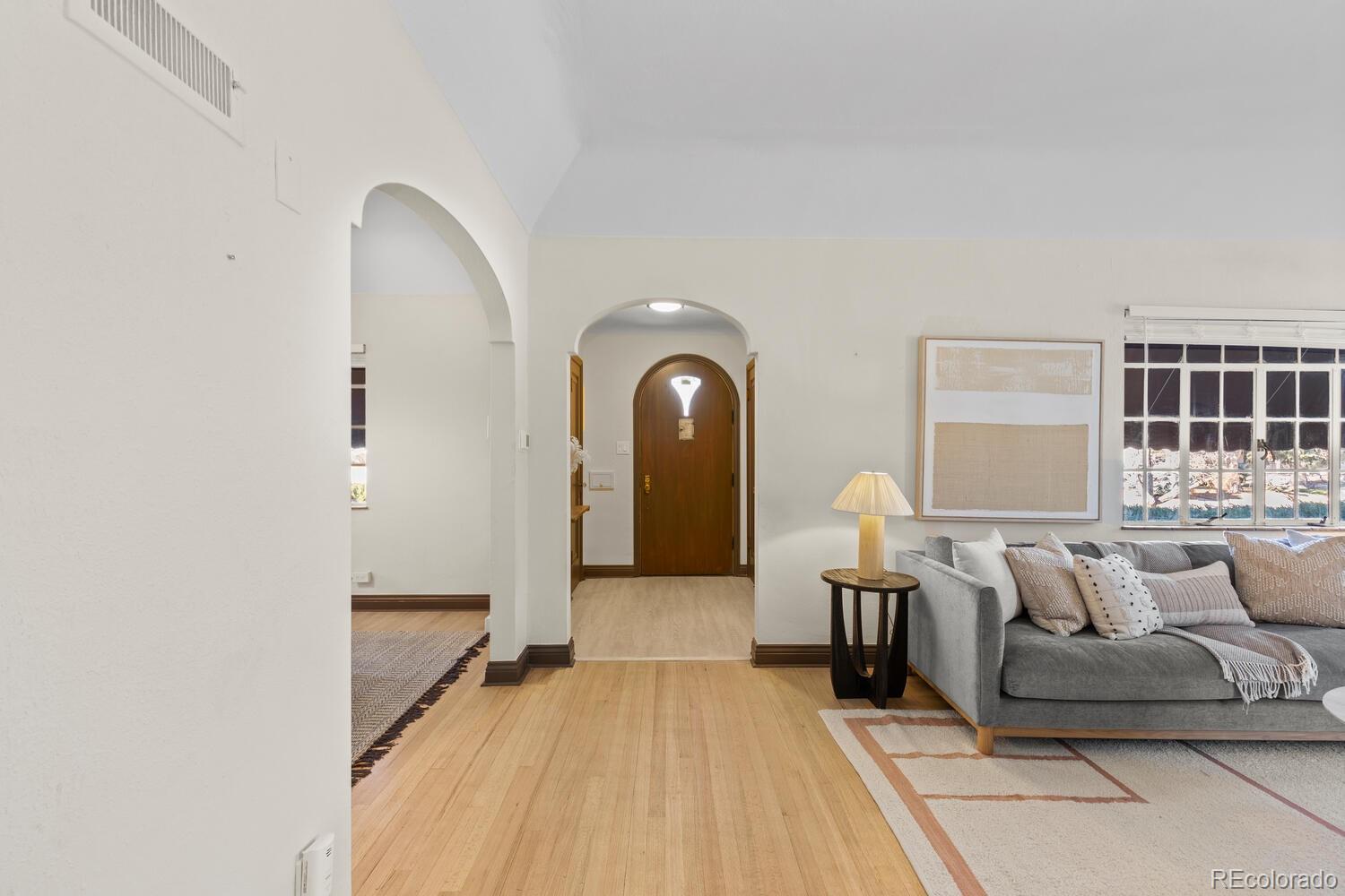 390 Dexter Street Denver, CO 80220 - Photo 5 of 30 a living room with furniture and a window