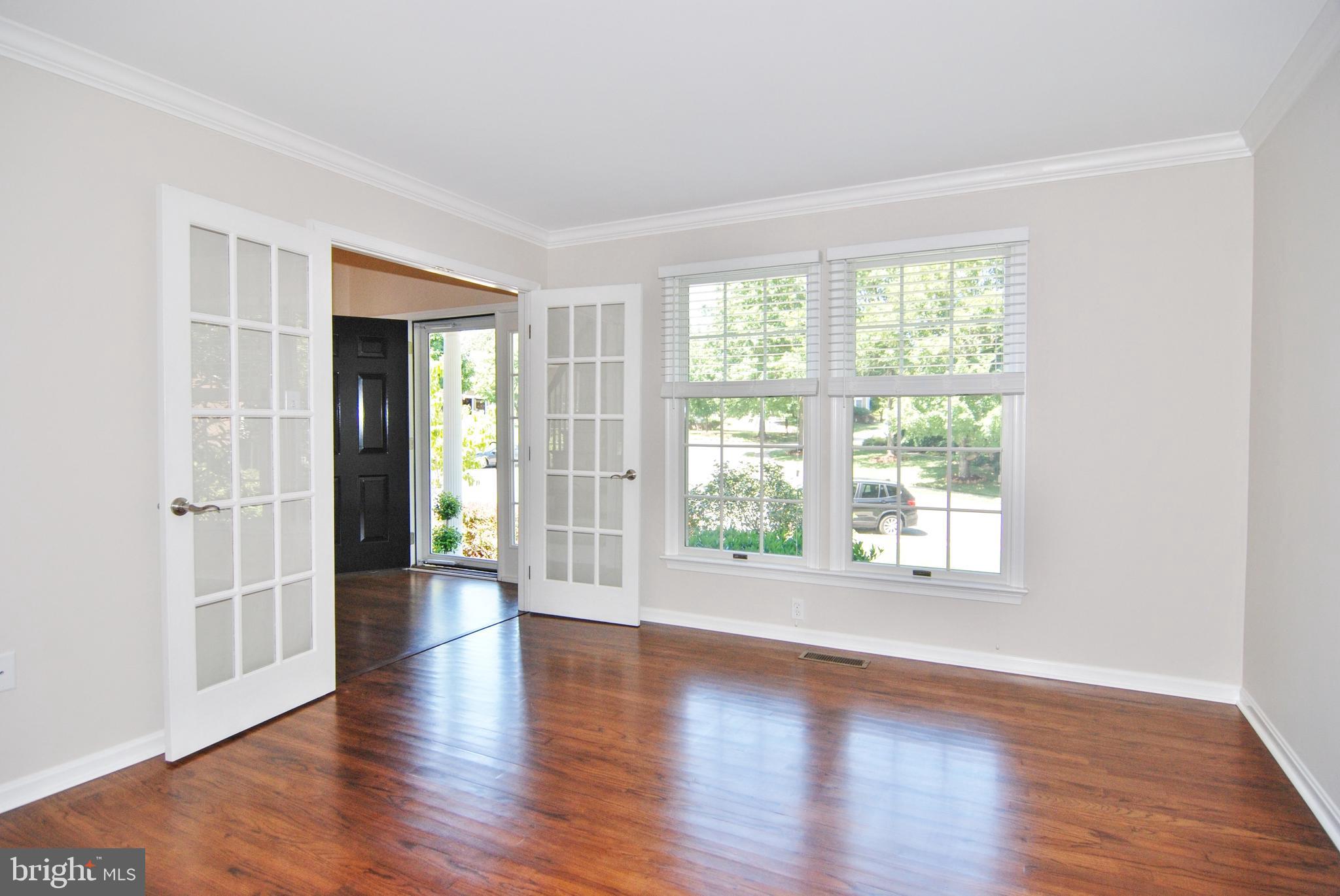 2205 Banner Hill Road Frederick, MD 21702 - Photo 7 of 46 The living room has brand new hardwood floors too!