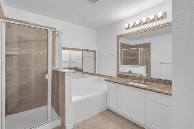 a bathroom with a sink a toilet and a bathtub