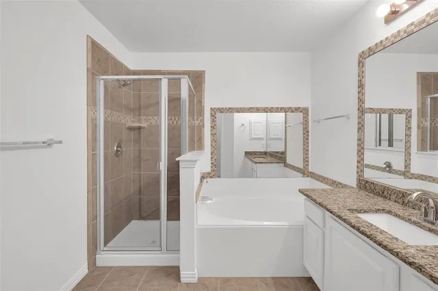 a view of a room with window and hardwood floor