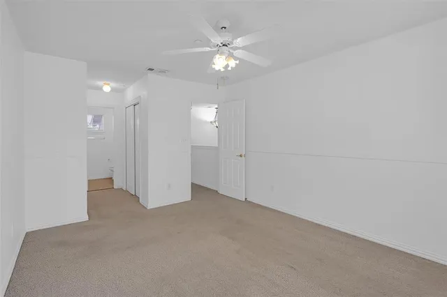 a view of a room that has a window in it