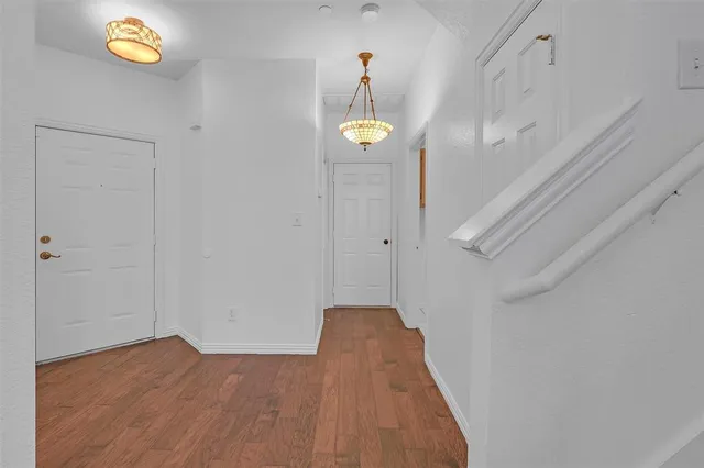 a backyard of a house with a small barn