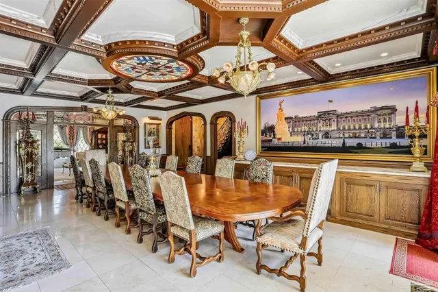 a view of a chairs and table in the house