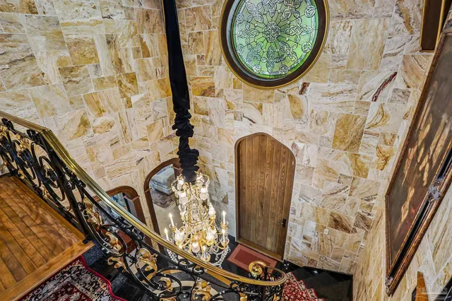 a view of water heater room with washer and dryer