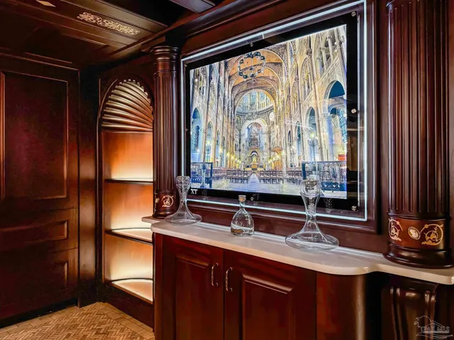 an aerial view of a houses with a yard