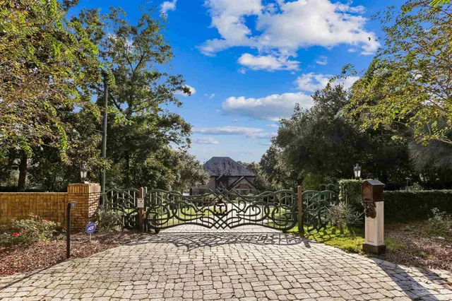 a view of a livingroom with fireplace and front door