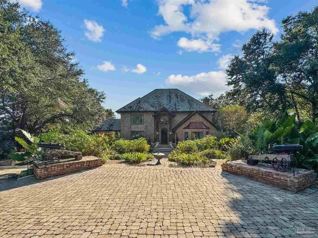 a front view of a fireplace with wooden floor
