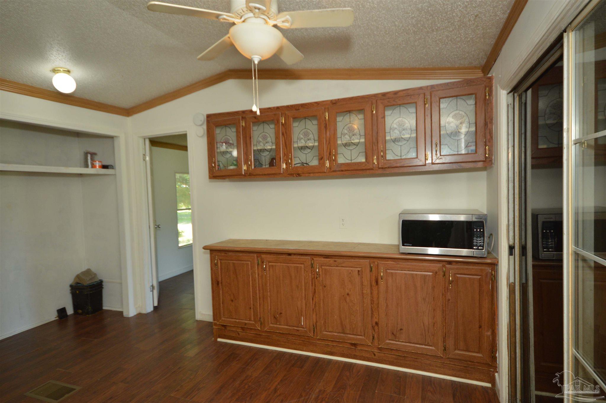 4401 B B Lowery Road Milton, FL 32583 - Photo 11 of 37 closet for w/d; hallway/door to master bedroom