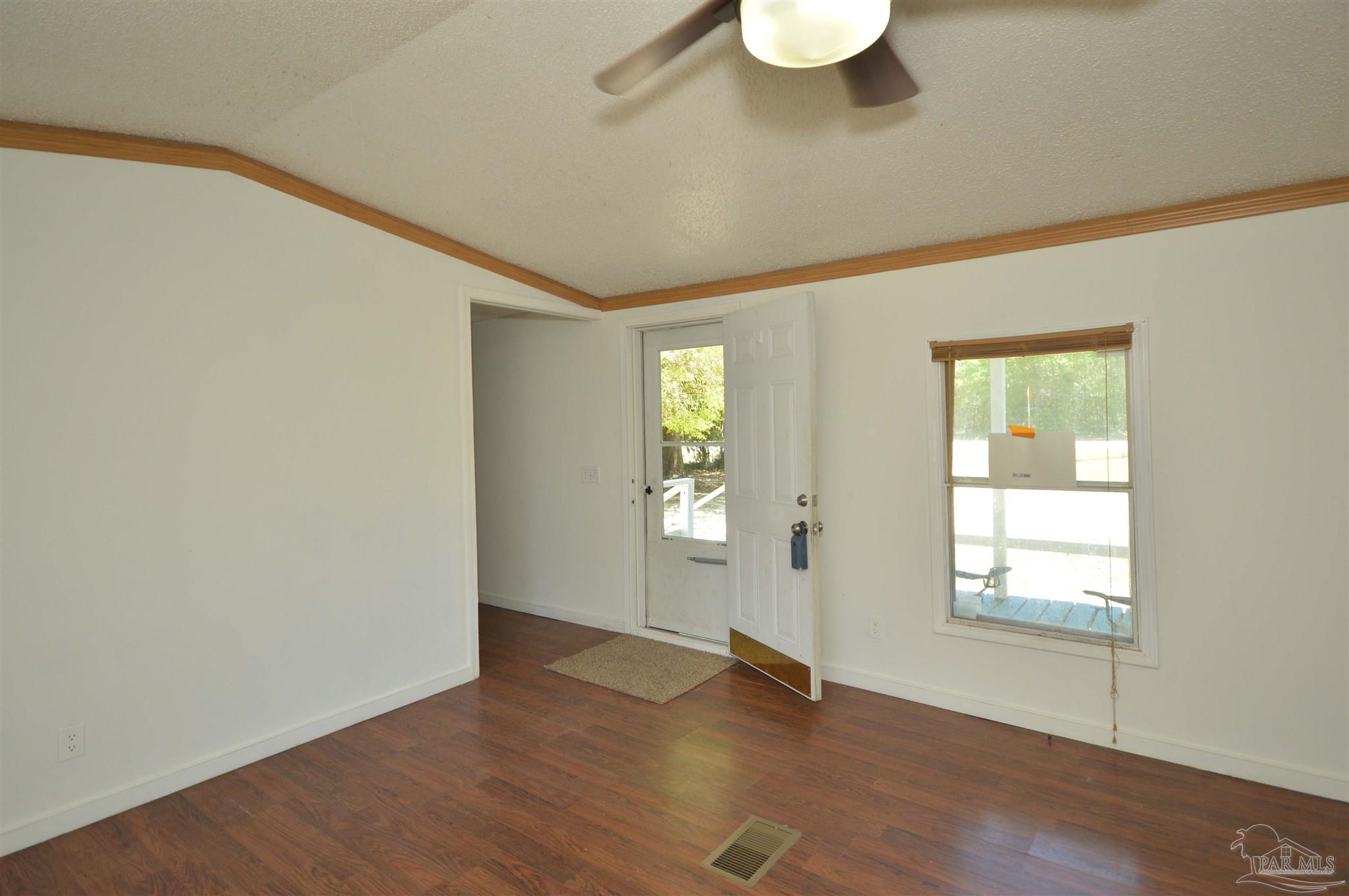 4401 B B Lowery Road Milton, FL 32583 - Photo 4 of 37 into family room